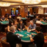 A captivating scene of players engaging in strategic blackjack gameplay at BJ88 casino, showcasing vibrant casino atmosphere.