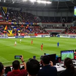 Nowgoal live soccer match scene filled with fans celebrating and players in action