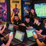 Players enjoying the XX88 online betting experience on various devices in an exciting gaming atmosphere.